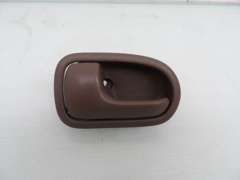 Left front driver oem inside door handle mazda protege 2000