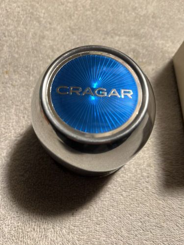 Crager center cap with baby blue center with original box 1cap