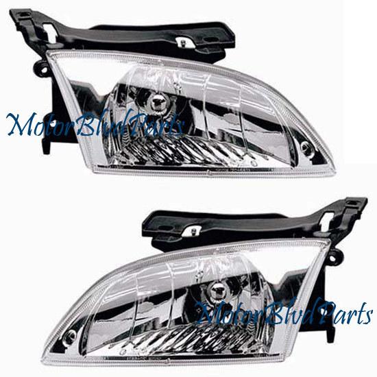 00-02 chevy cavalier headlights headlamps lh+rh set 2pc