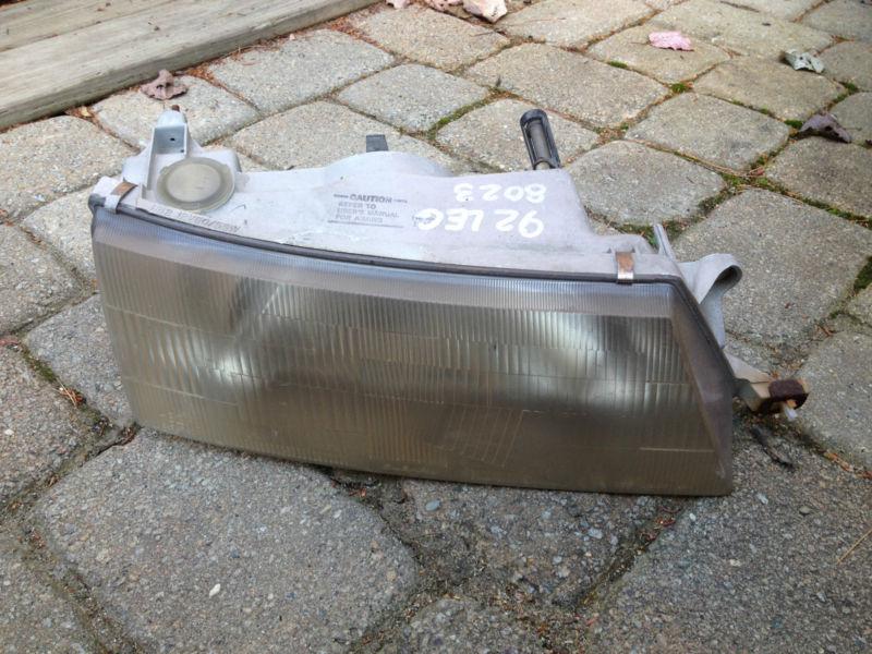 92 93 94 subaru legacy passenger side headlight. rh side. oem.