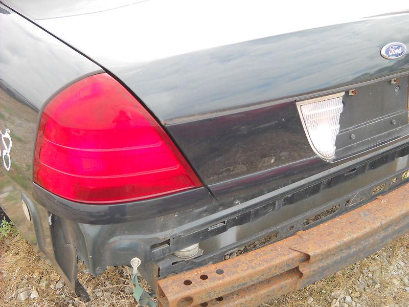 2000-2011  ford crown victoria left taillight all red lens,2 bulbs,painted trim