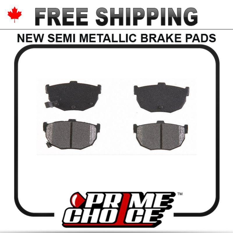 New premium complete set of rear metallic disc brake pads with shims