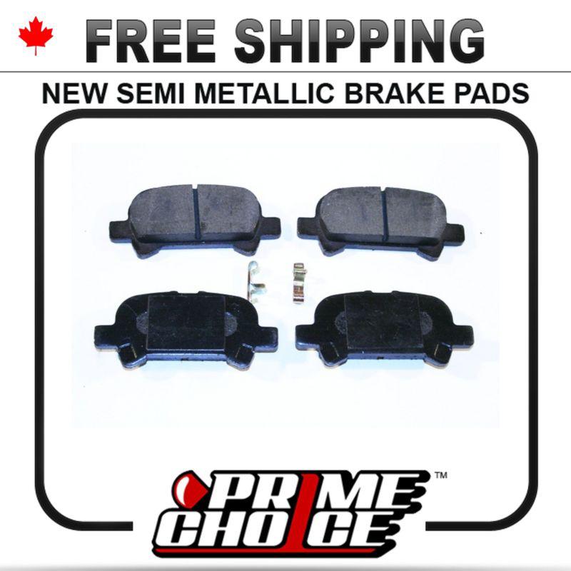 New premium complete set of rear metallic disc brake pads with shims