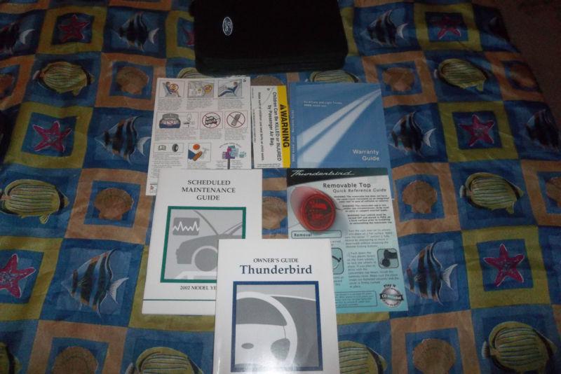 2002 ford thunderbird  owner's manuals and case