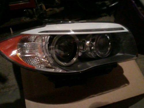 2012 bmw right side headlight xenon/used/save$$$$