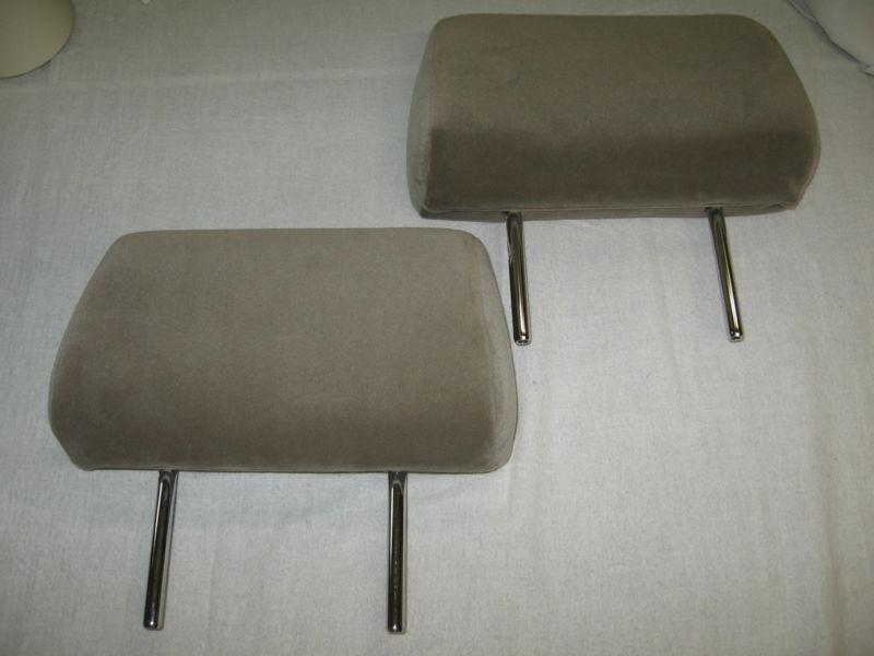 A matching pair (2)  2005 toyota tacoma back seat headrests