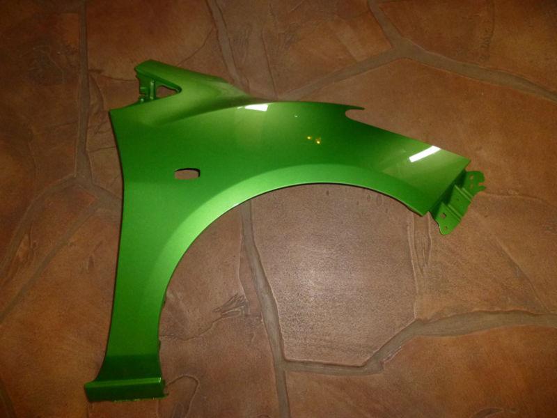  mazda 2, mazda2 rh/passenger side fender, spirited green metallic, new