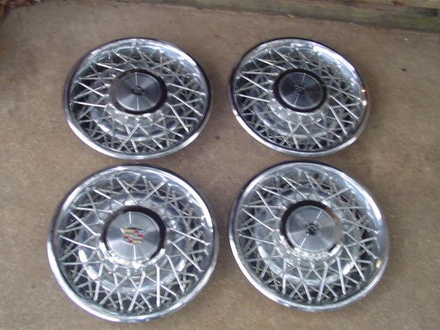 Lot of 4 cadillac 15" wire spoke 2017 hubcaps 1975-84 wheel cover deville fleetw