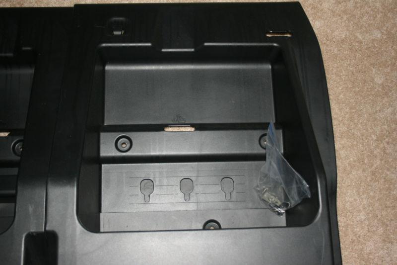 Toyota tacoma rear storage plastic trim compartment