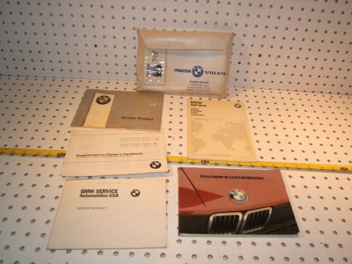 Bmw 83 e28 528e/533i owner&#039;s manual 1 set of 5 booklets/ paper &amp; non oem 1 pouch