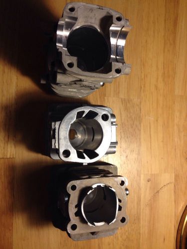 Unknown lot of 3 new two cycle gas engine cylinders, briggs, tecumseh, poulan ??