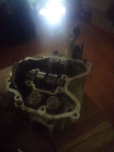 2006 kawasaki prairie,  700 front cylinder  head complete with cam and  rockers