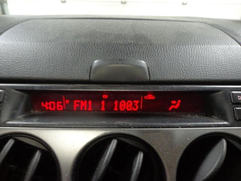 03 04 mazda 6 audio equipment display radio temp clock