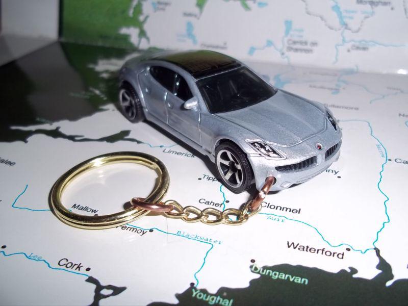 Custom mint keychain 2011 fisker karma ,silver w/silver mags