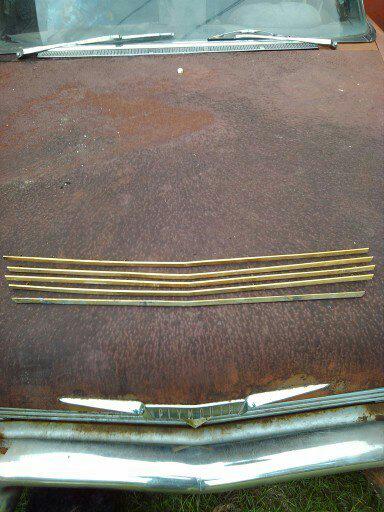 1958 fury original lower grill trim pieces