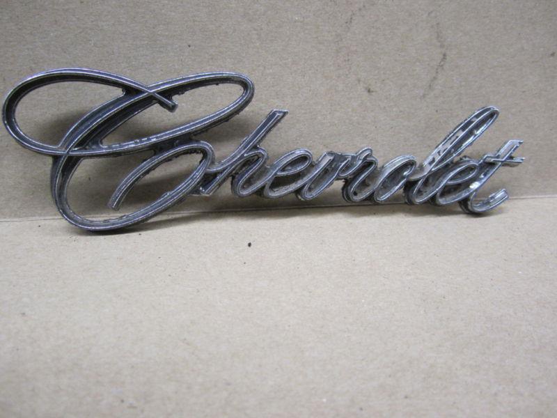 Chevy chevrolet emblem ornament " chevrolet "  in script  metal chrome