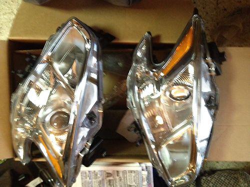 2009 - 2012 maxima head lamps oem brand new driver and passenger.