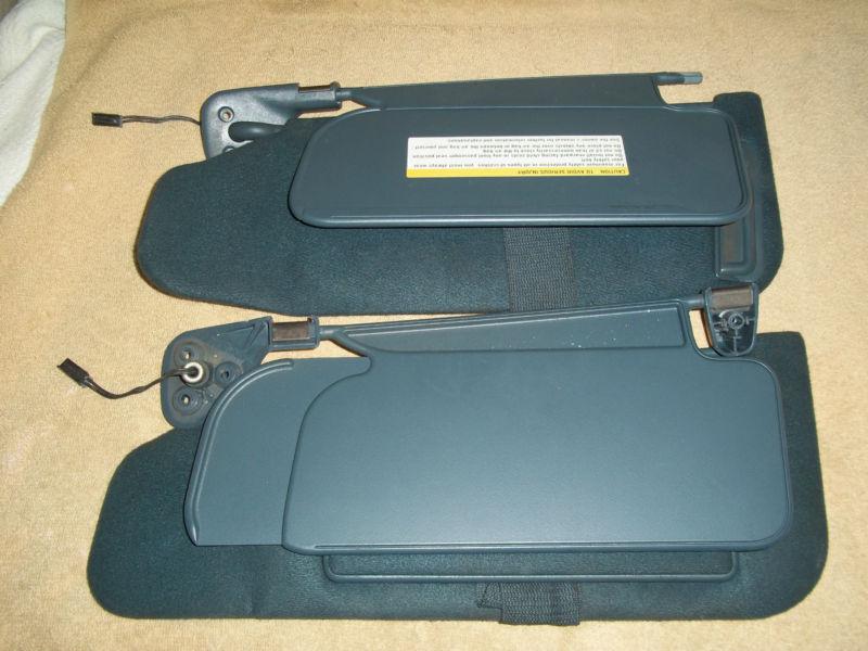 1995 oldsmobile aurora sun visors with lighted mirror sun shield panels hangers.