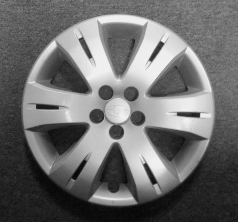 Subaru legacy oem wheel cover good used condition and free shipping in the usa