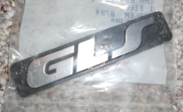 Volkswagen "gls" emblem new in package oem pn 1hm-853-714-e-gx2