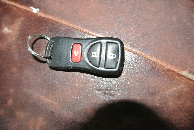 Used nissan keyless entry key remote frontier alarm + free programming 08