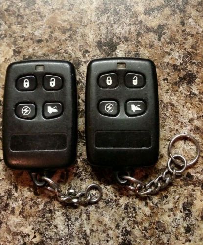 Lot of 2 premier 05-a433 keyless entry alarm remote fobs, item 432