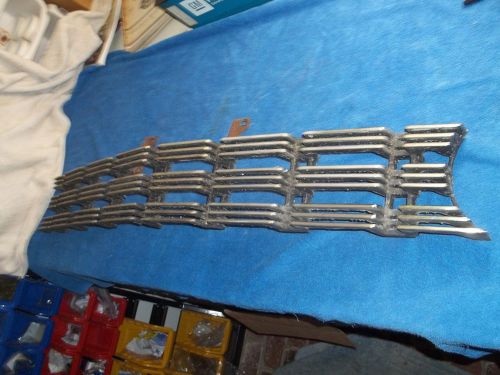 1960 oldsmobile grill  solid original