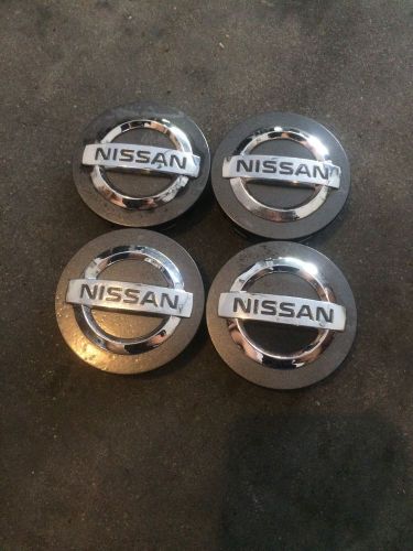 Nissan center cap# 40342au510 silver wheels center caps 4 caps