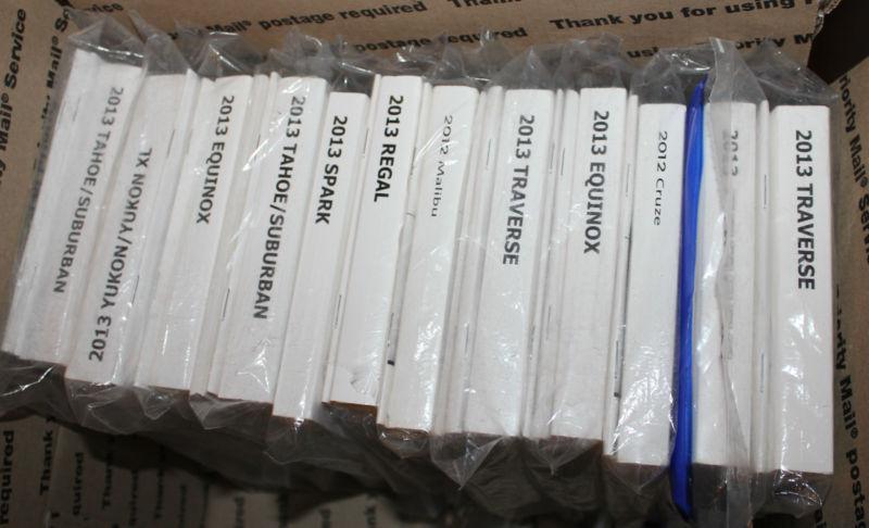 Lot of 12 - - 2012 & 2013 gm owners manuals brand  new - mint in factory wrap