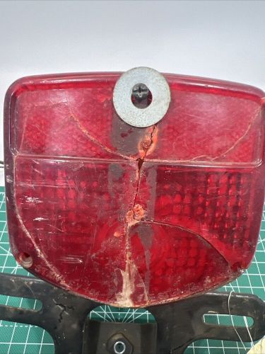 1976 honda cj360t rear back tail light mount bracket broken see pics used. st29