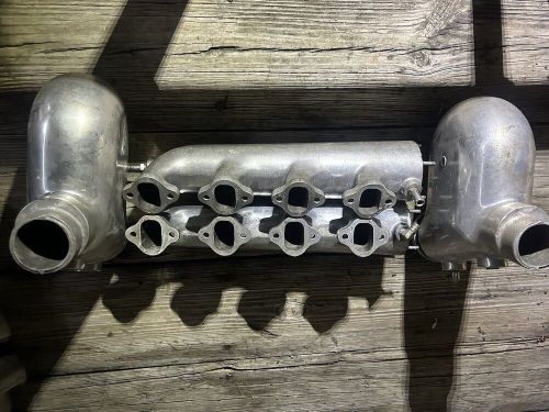 Used log exhaust manifolds and risers for ford big block 460 engine jet boat.