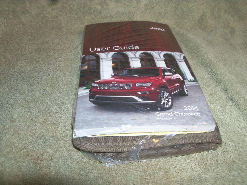 Jeep grand cherokee 2014 owners guide , dvd, case & misc brochures