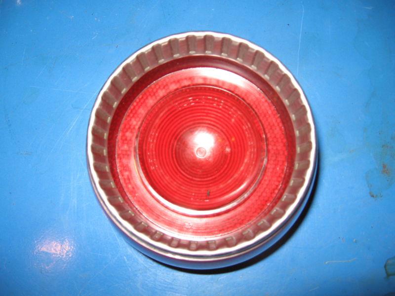 1958 pontiac tail light lens, used, good condition, no cracks or breaks.