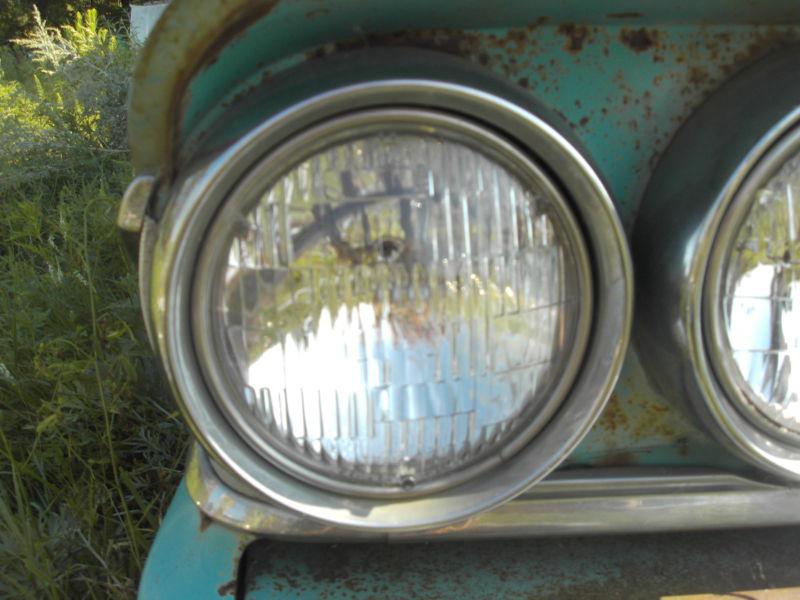  1958 mercury monterey headlight bezel door 