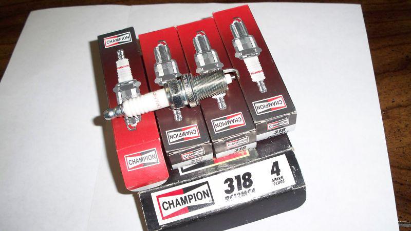 4 new champion copper plus spark plugs rc12mc4 318