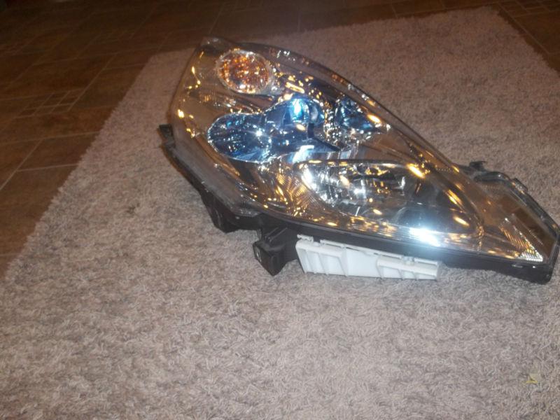 2011-2012-2013 nissan leaf passenger/right side xenon led headlight oem