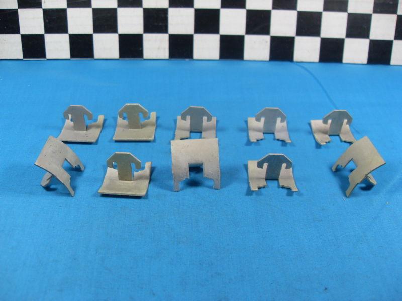 Nos gm 1940 oldsmobile running board molding clips,  1940 10 clips