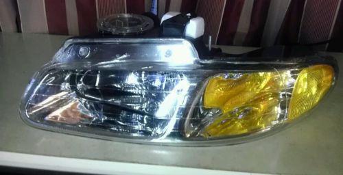 New driver side left headlight oem 