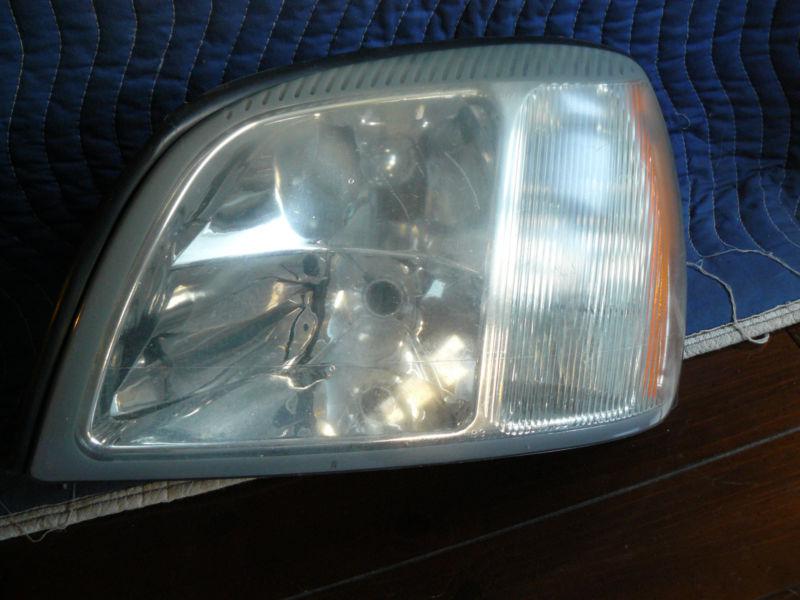 Used 2004 cadillac deville left headlight oem 25769519