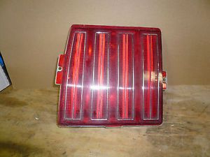 Pontiac tail light lens/housing (lh) p/n 5970643 1 a oem - vintage