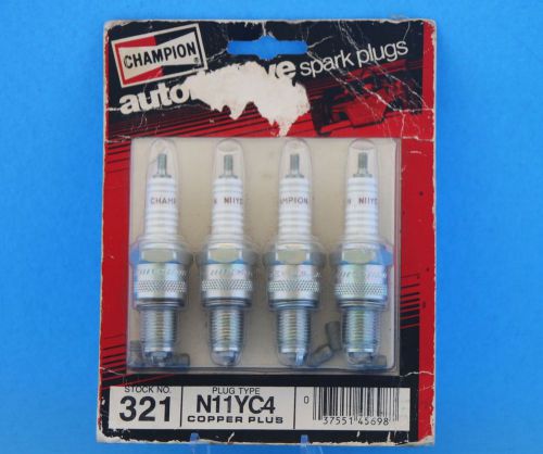 Four champion n11yc4 copper plus spark plugs new old stock + free shipping