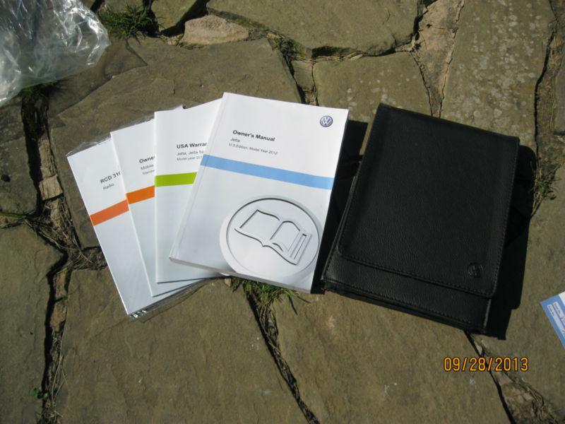 2012 volkswagen jetta owners manual guide with case set 12