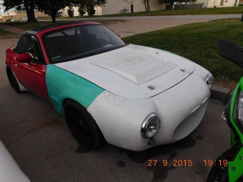 1990-95 miata front s2 racing front clip with vented hood.