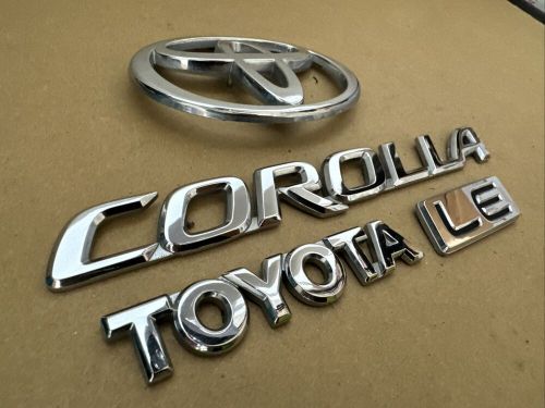 Free ship! oem 2003-2008 04 05 06 07 08 toyota corolla le rear badge emblem set