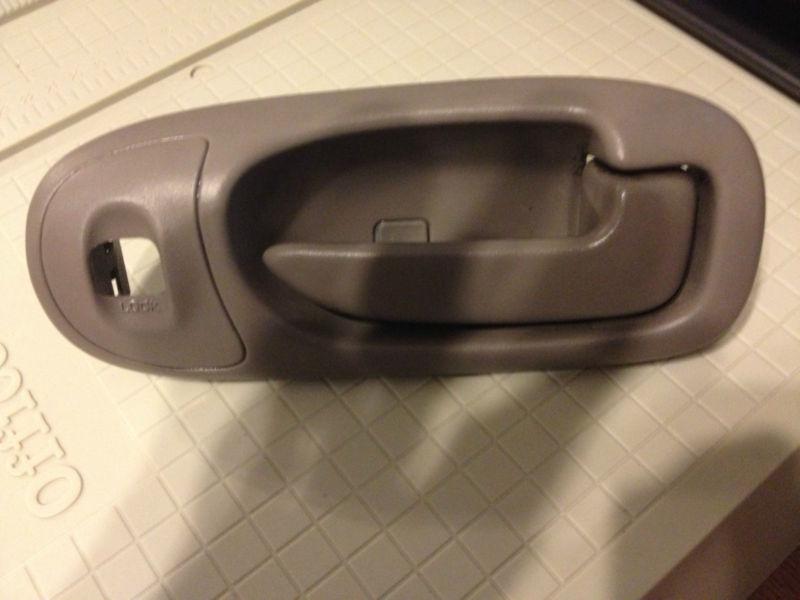 2001-2006 sebring convertible beige interior pass door handle rt 