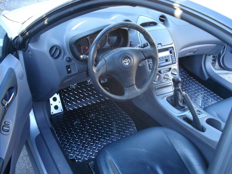 Celica 99-05  aluminum diamond plate floor mats. custom shaped front two pc set