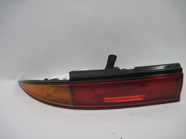 Tail light infiniti j30 1993 1994 qtr mtd left small chip on trim 375376