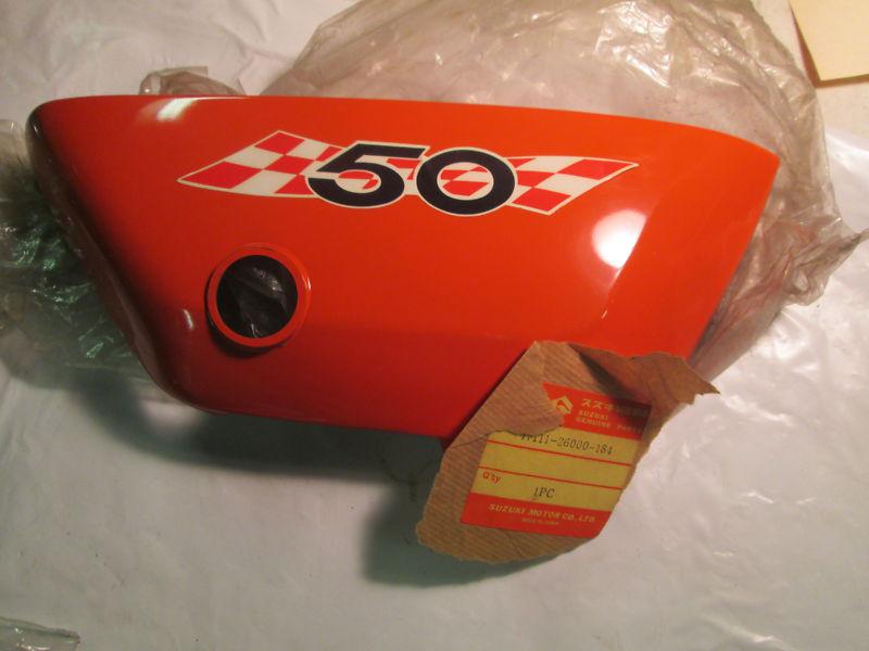 Suzuki ts50 nos oem r/h side cover w/ decal in orange 1972 p.n. 47111-26000-184