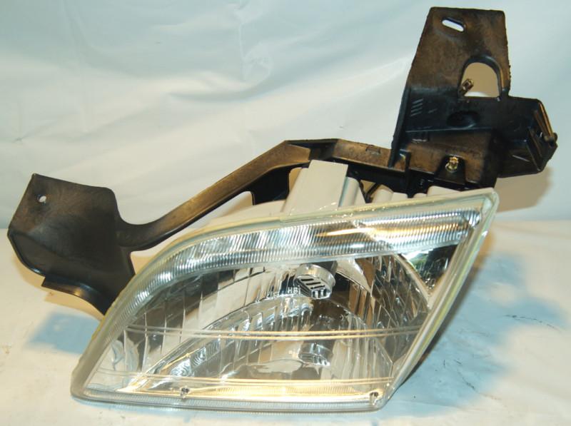 Nos oem genuine gm 16521697 head light / lamp