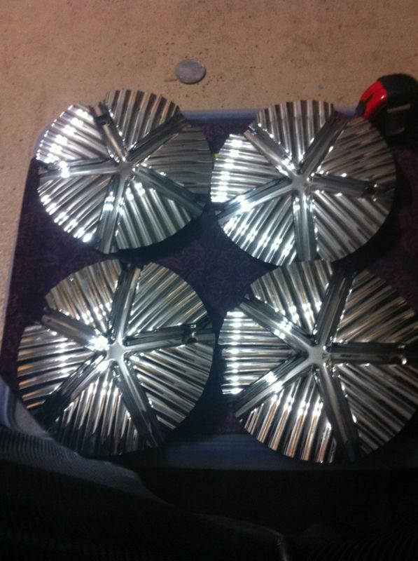 4 limited wheels chrome center caps  part# n23b